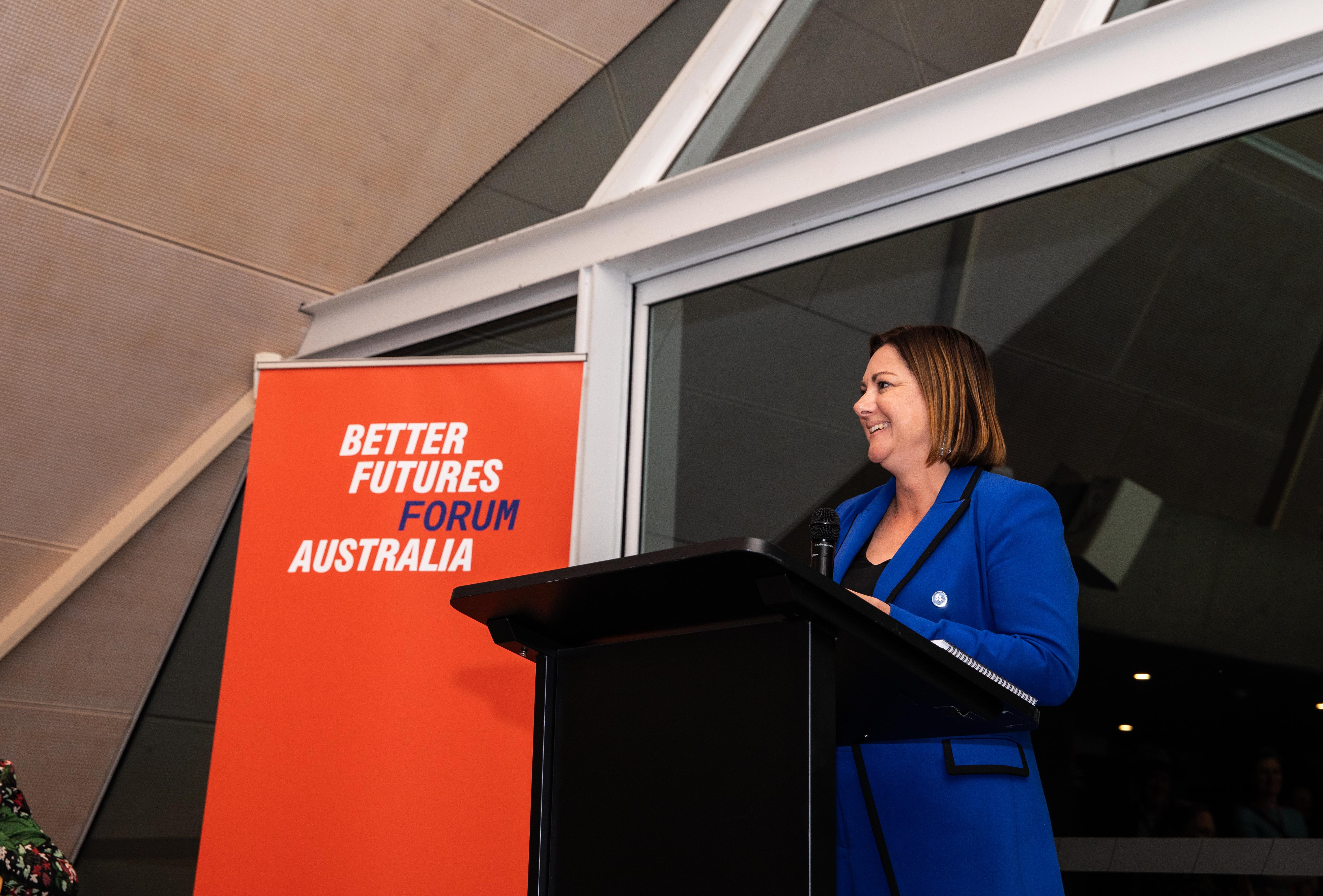 Minister McBain presenting at the Better Futures Forum